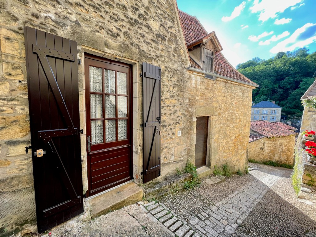 The main entrance to Maison Delluc is through this massive 9-foot door