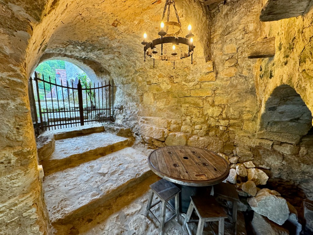 Maison Delluc- Experience the unique ambiance of our medieval underground vault, a centuries-old passageway in ancient times